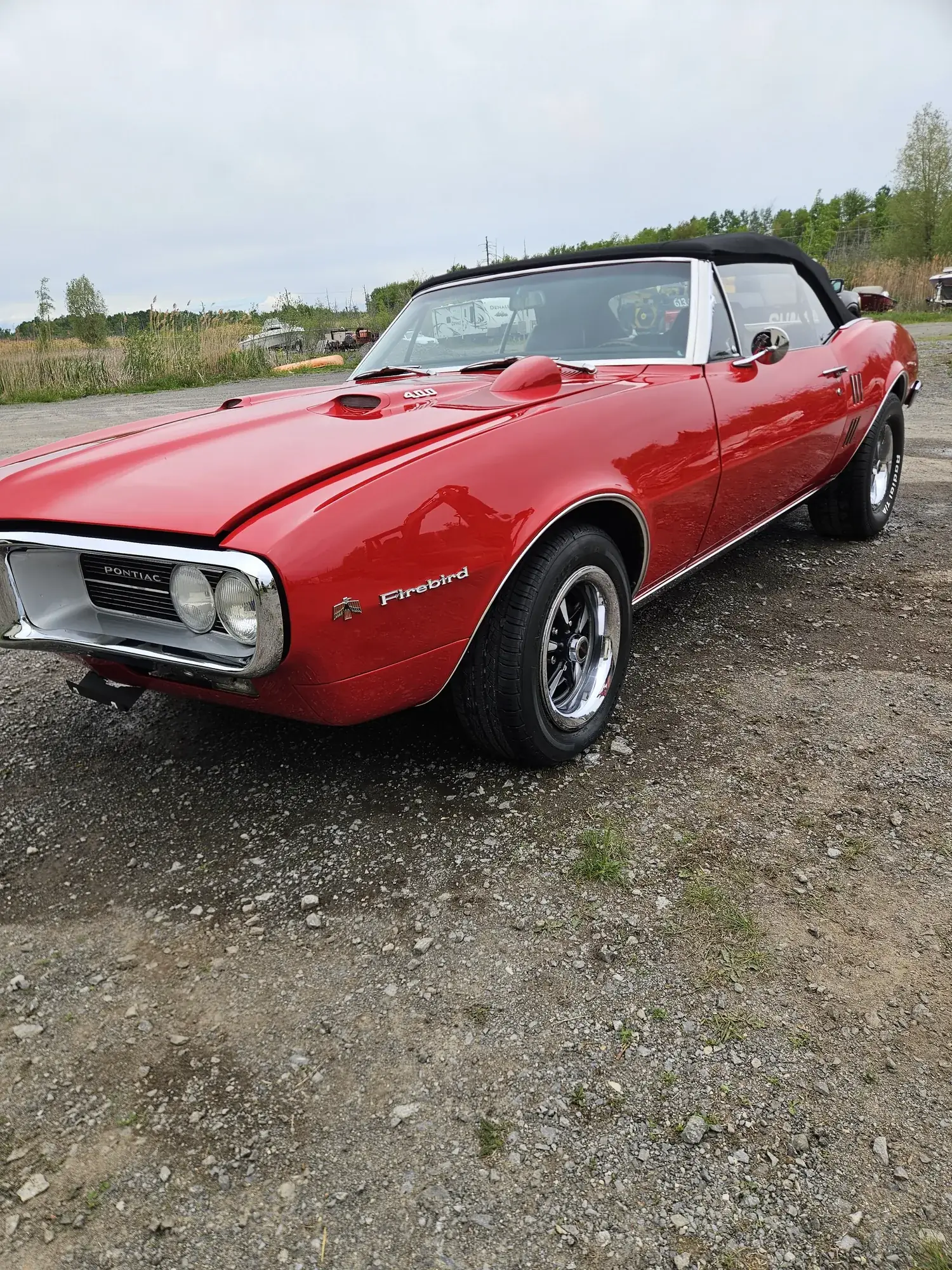 Red Firebird convertible after a detail
