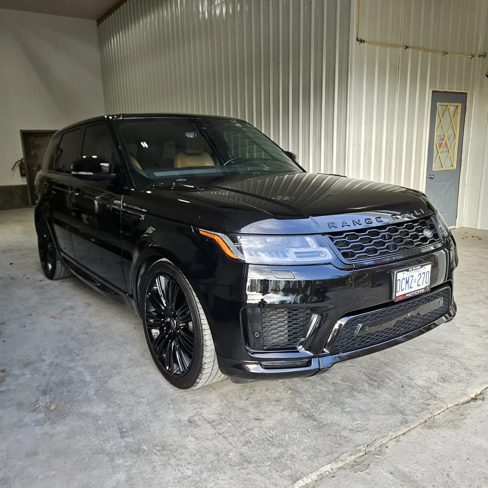 Black Range Rover after correction, in the shop